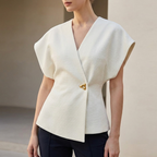 Light wrap-front blouse with V-neck and short sleeves, gold clasp detail
