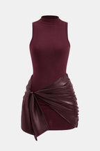 Burgundy sleeveless high-neck mini dress with ruched faux leather tie-front back