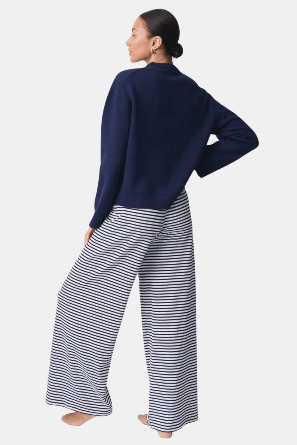 Navy and white striped wide-leg trousers with drawstring waist, flared leg
