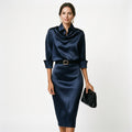 Navy satin cocktail midi dress with draped cowl neck, 3/4 sleeves and waist belt.