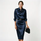 Navy satin cocktail midi dress with draped cowl neck, 3/4 sleeves and waist belt.