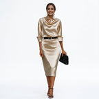 Champagne satin cocktail midi dress with draped cowl neck, 3/4 sleeves and waist belt.