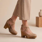 Khaki closed-toe platform wedge sandals with ankle strap and crisscross upper