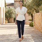 Light wrap-front blouse with V-neck and short sleeves, peplum-style waist