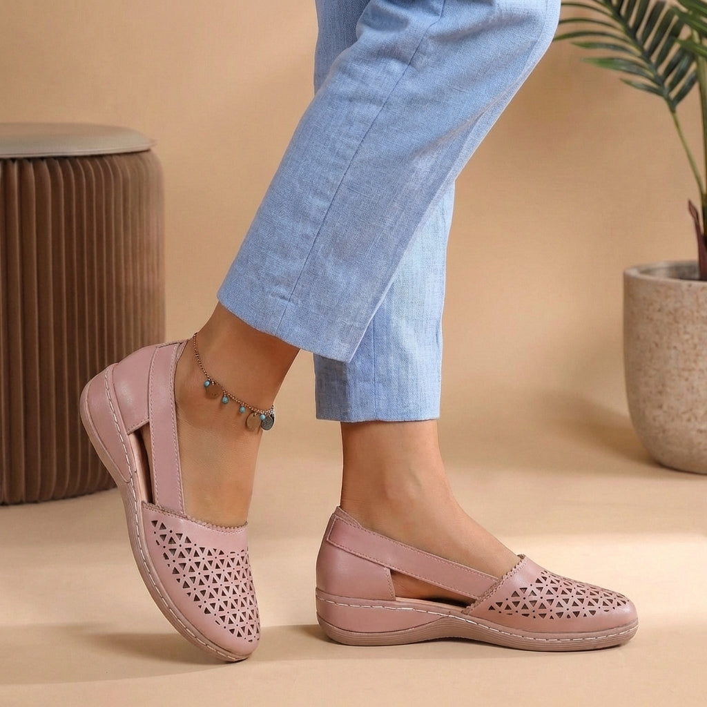Women's slip-on casual shoes in blush pink with cutout design and open side