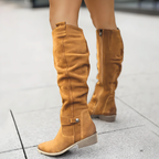 Slouchy knee-high riding boots in mustard, low block heel, slouchy shaft