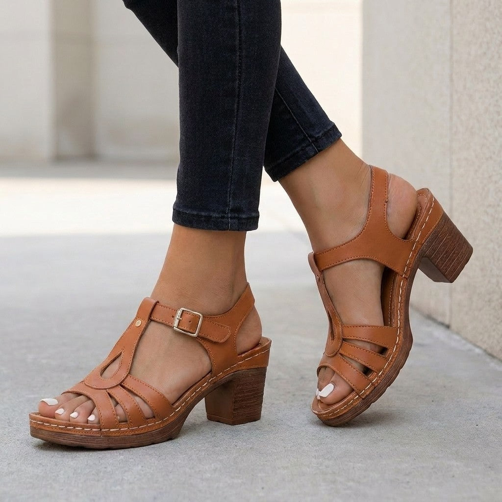Tan women's T-strap sandals with block heel and cushioned footbed, buckle ankle strap