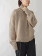 Women's beige turtleneck sweater in soft knit with ribbed collar and hem