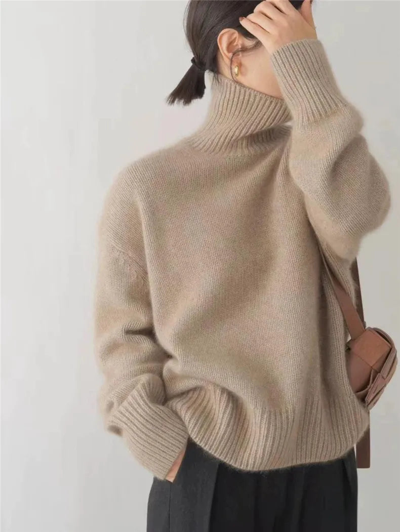 Women's beige turtleneck sweater with ribbed collar and cuffs, long sleeve knit