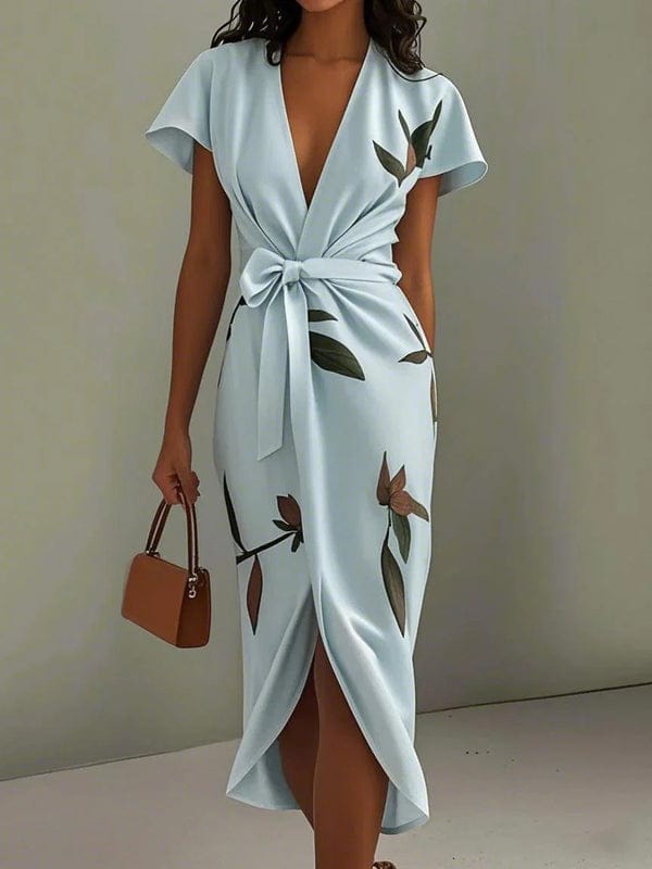 Light blue leaf-print V-neck midi dress with tied waist bow and wrap front slit