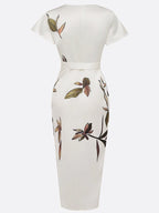 White back-view midi dress with waist belt tie and leaf print