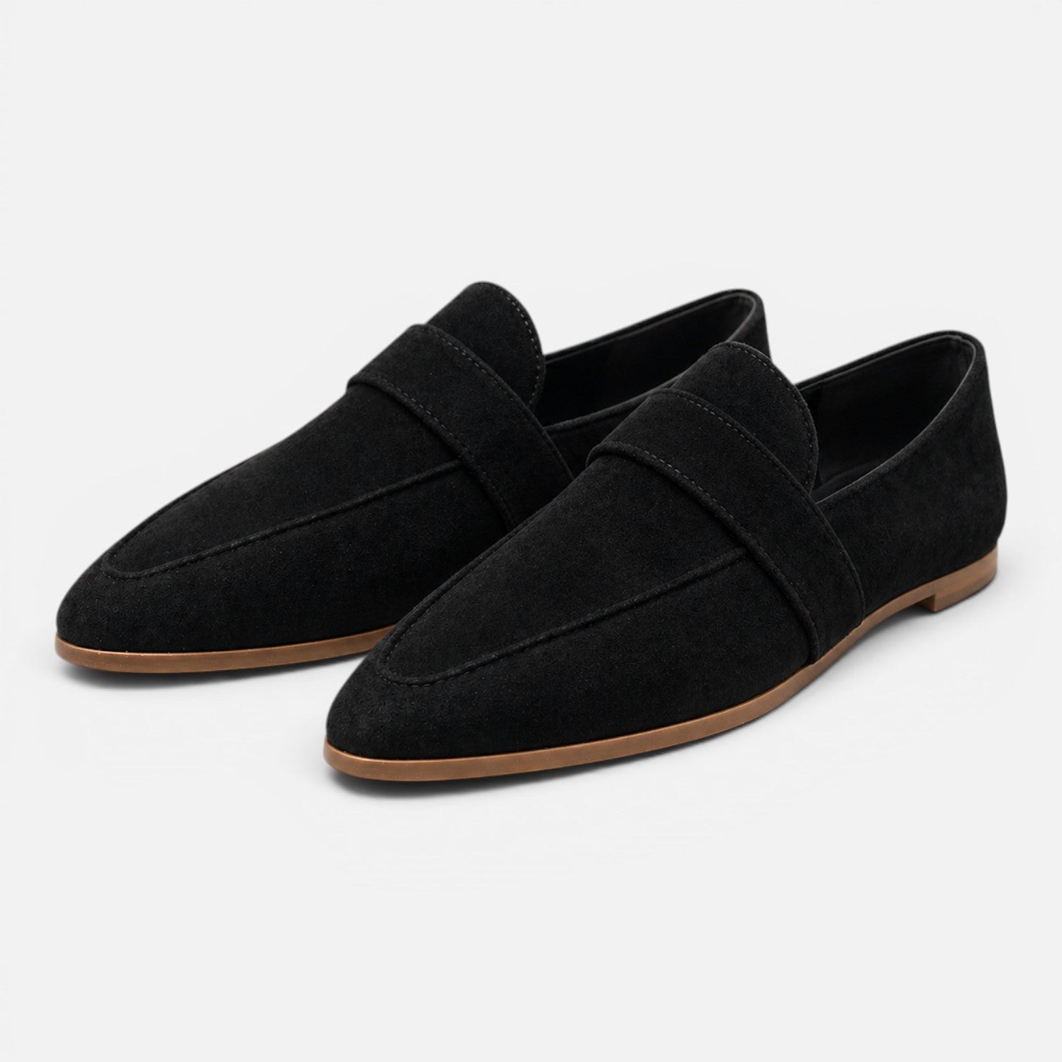 Women's black suede pointed-toe loafers, slip-on style with strap detail.
