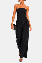 Black strapless corset wide-leg jumpsuit with pleated waist and flowing wide trousers
