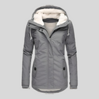 Gray long hooded winter coat with faux fur lining, zip front, flap pockets.