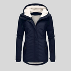 Navy blue long hooded winter coat with faux fur lining, zip front, flap pockets.