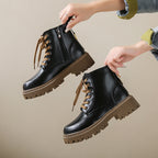 Women’s black lace-up boots with side zipper, round toe, chunky lug sole