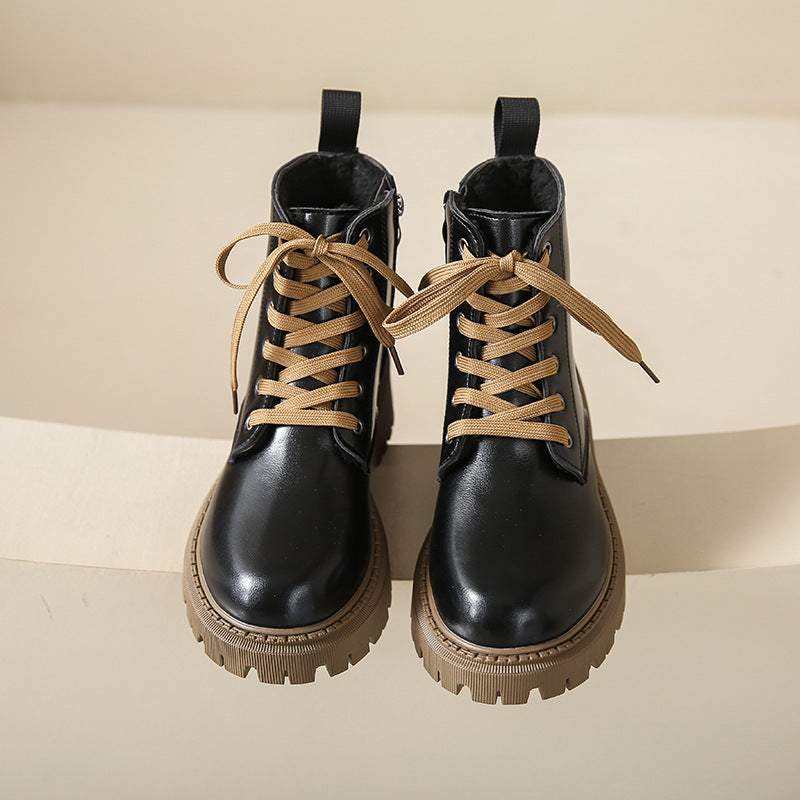 Women's black lace-up side-zip ankle boots with tan laces and chunky lug sole