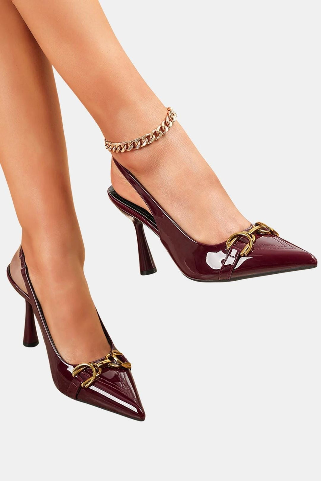 Burgundy patent slingback pumps on high heels with gold horsebit clasp