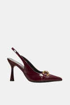 Burgundy patent slingback pumps with gold horsebit buckle and pointed toe