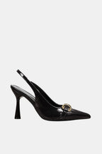 Black patent slingback pumps with gold horsebit hardware and pointed toe