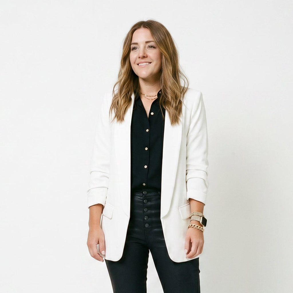 Women’s white blazer with notch lapel and front flap pockets