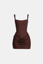 Brown corset-style mini dress with square neckline and ruched drape overlay