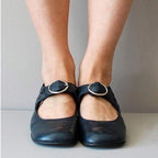 Navy Mary Jane shoes with adjustable buckle strap, rear and toe view
