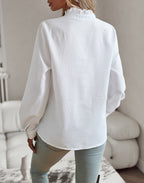 White long-sleeve ruffle button-up blouse, back view with ruffled collar