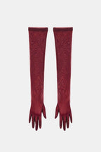 Sheer mesh elbow-length gloves in deep burgundy with patterned stretch and fringed fingertips.