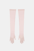 Sheer mesh elbow-length gloves in light blush pink with patterned texture and fringed fingertips.