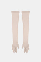 Sheer mesh elbow-length gloves in ivory with patterned texture and fringed fingertips.