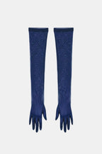 Sheer mesh elbow-length gloves in navy with patterned stretch and fringed fingertips.