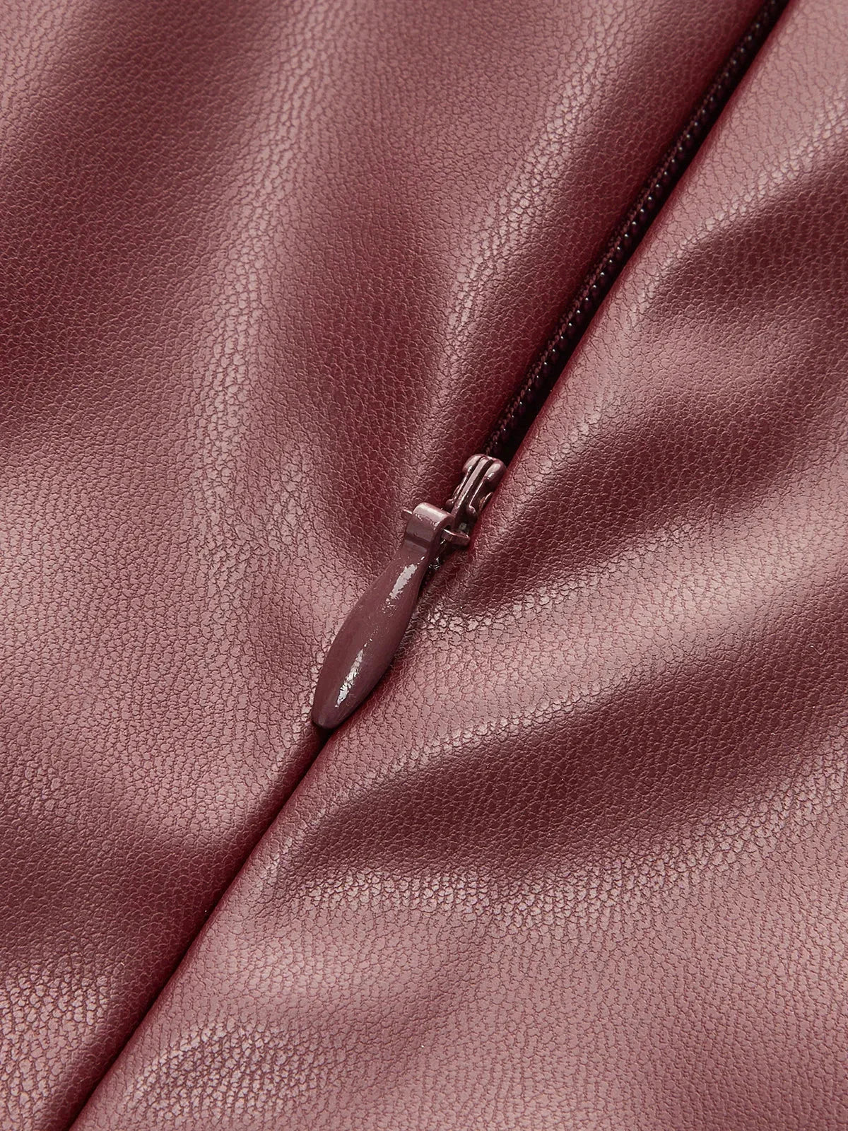 Burgundy faux leather mock-neck top zipper detail on seam