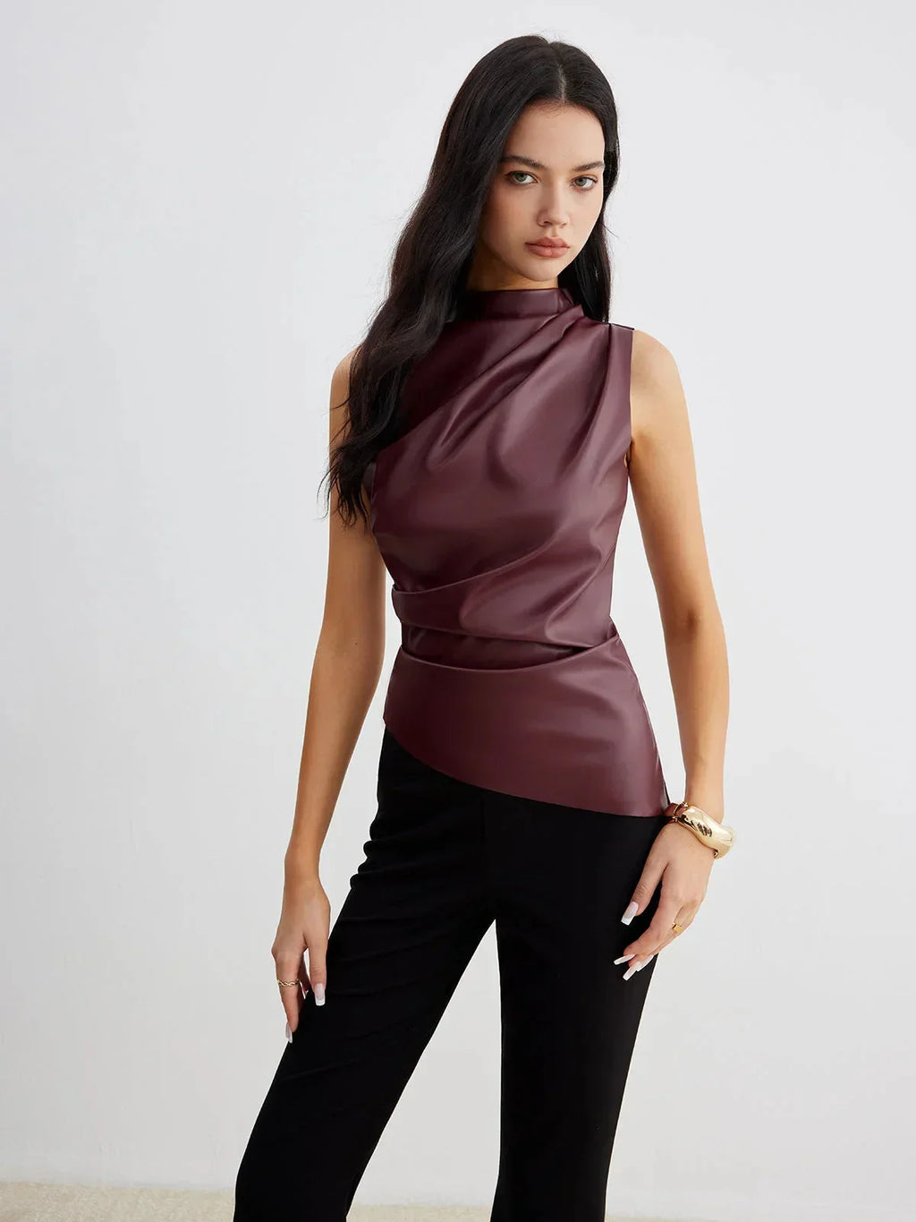 Burgundy faux leather sleeveless mock-neck top with high collar