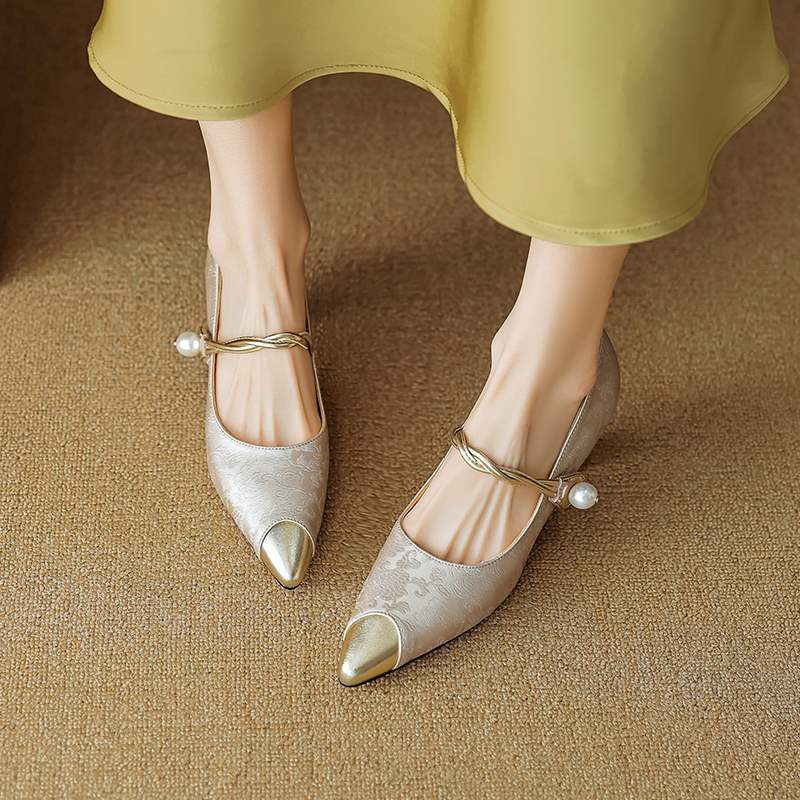 Metallic pointed kitten heels with pearl strap and gold buckle, low block heel