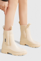Women’s beige slip-on ankle boots with ribbed elastic gore and chunky sole