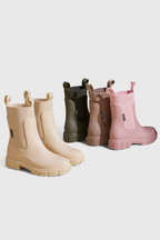 Women’s slip-on ankle boots in assorted colors, each with elastic gore and chunky sole