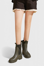 Women’s dark olive slip-on ankle boots with elastic gore and thick treaded sole