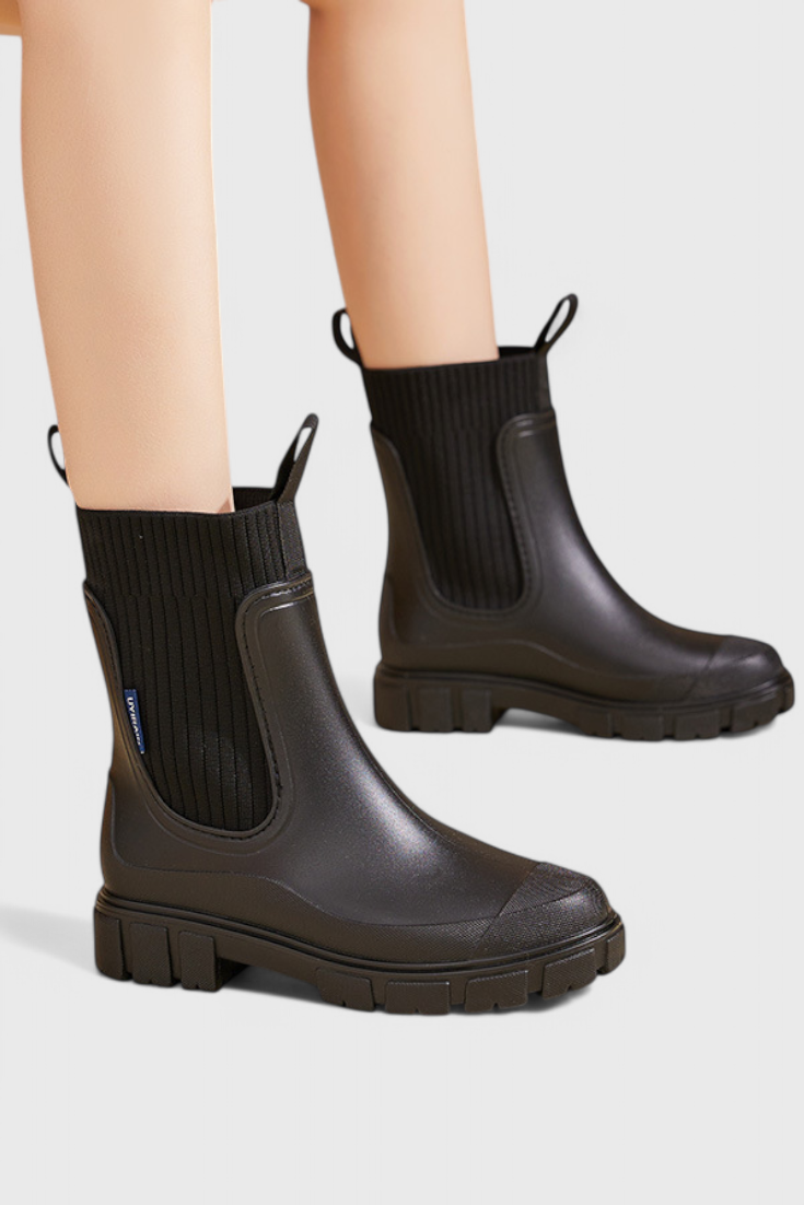 Women’s black slip-on ankle boots with side elastic gore and rugged block heel sole