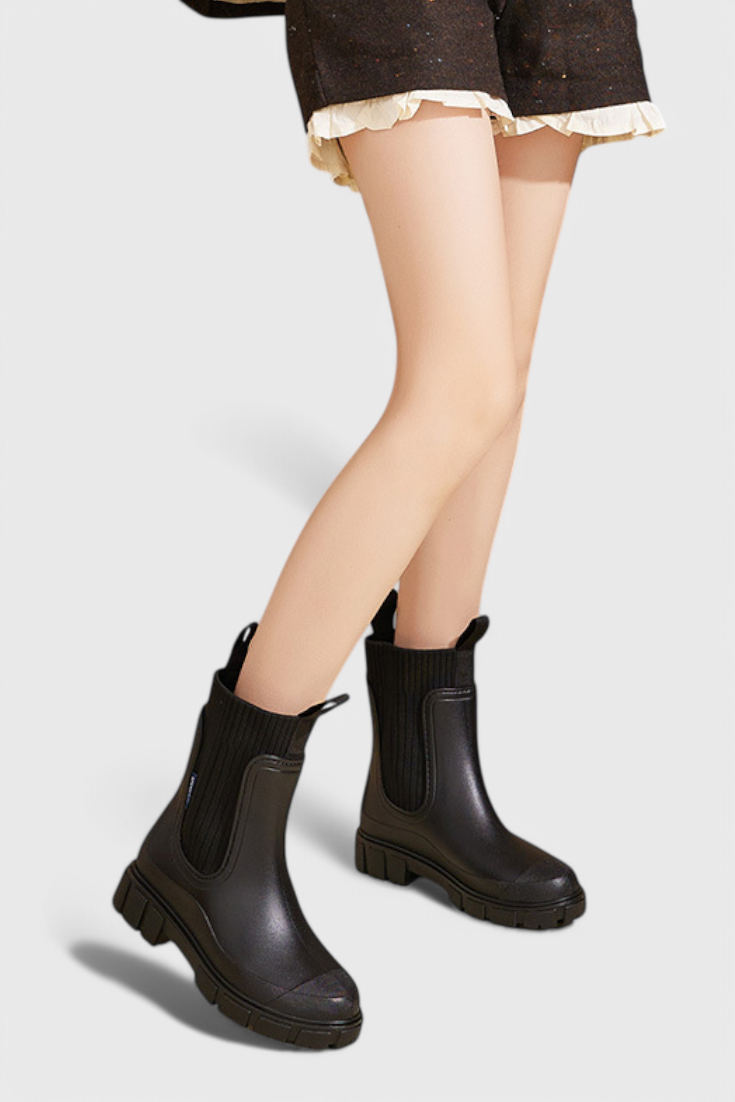Women’s black slip-on ankle boots with elastic gore and chunky treaded sole