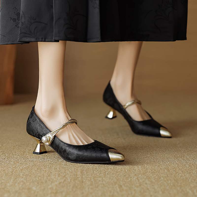 Black pointed kitten heels with pearl strap and gold buckle, low block heel