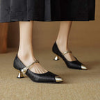 Black pointed kitten heels with pearl strap and gold buckle, low block heel