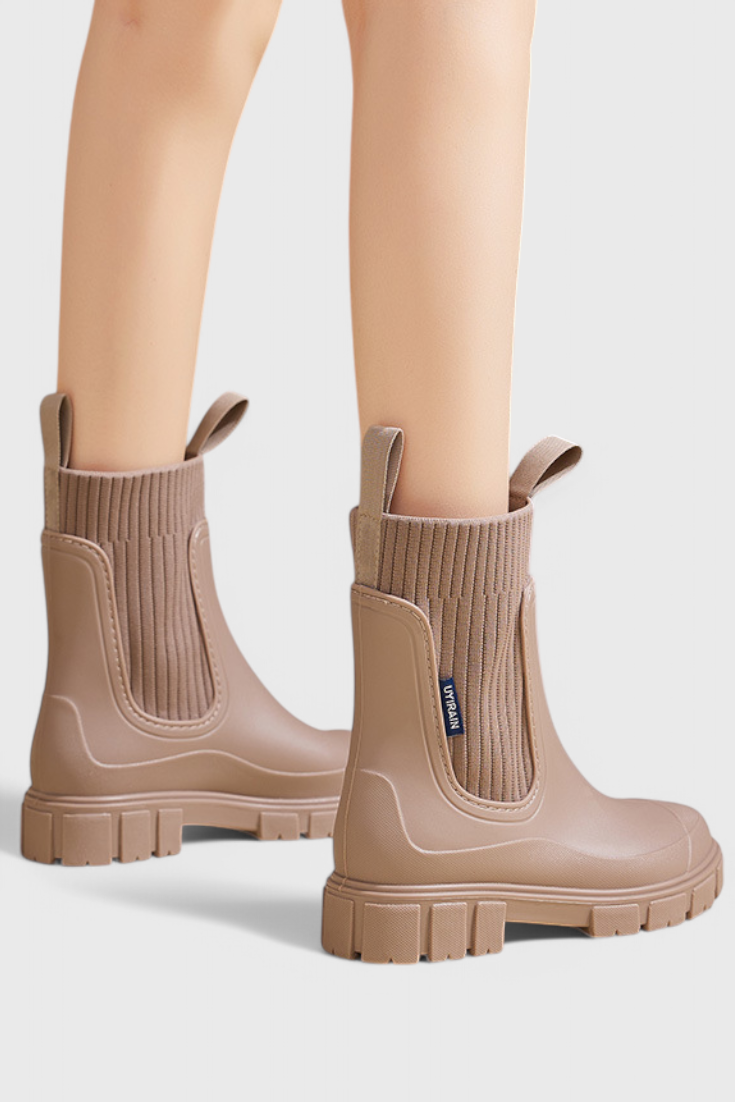 Women’s taupe slip-on ankle boots with elastic gore panels and chunky tread sole
