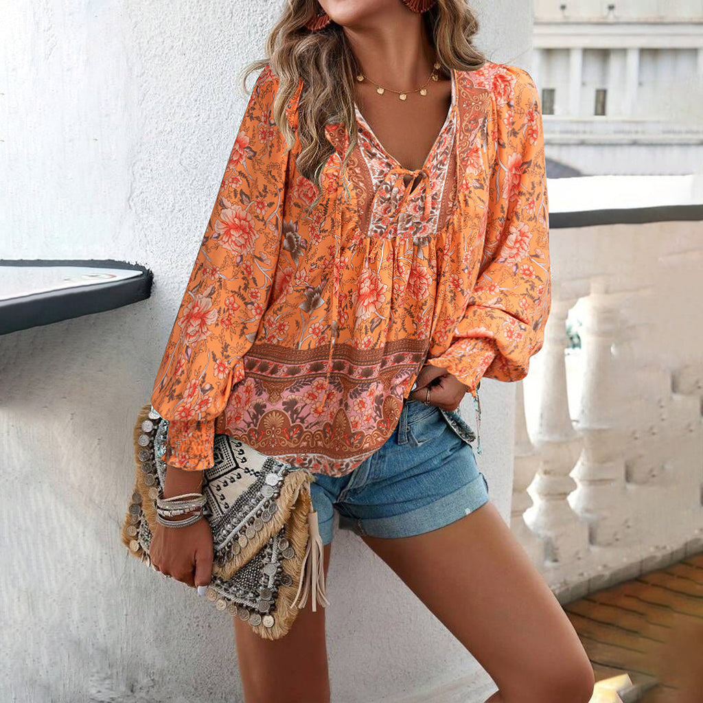 Boho floral print blouse in orange, V-neck tie, gathered neckline, long balloon sleeves