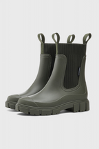 Green slip-on ankle boots with ribbed elastic shaft, side gore pull-on panel.