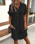 Black collared mini button-front pocket dress, short sleeves, button placket
