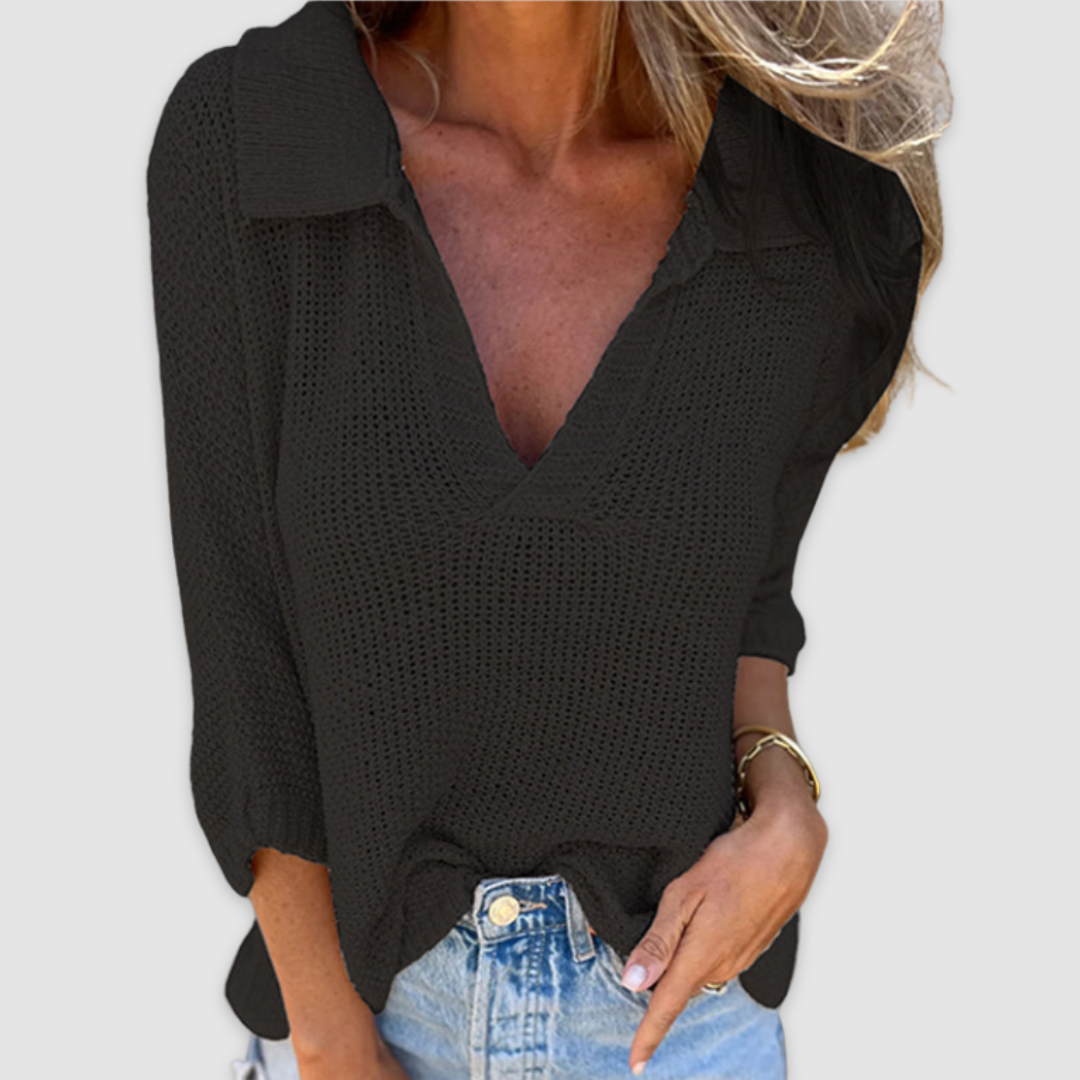 Black knit V-neck top with textured openwork and three-quarter sleeves