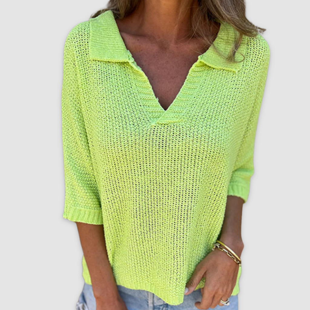Neon green knit V-neck top with ribbed collar and cuffed three-quarter sleeves