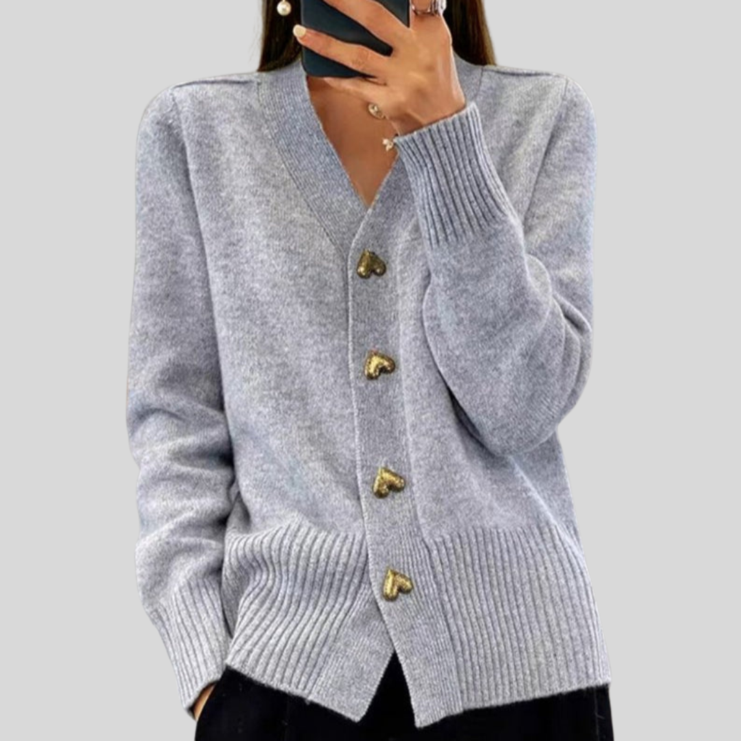 Gray cardigan sweater with V-neck, long sleeves, ribbed cuffs, heart-button front.