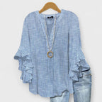 Women’s v-neck blouse with ruffle sleeves, blue-and-white pinstripe with beaded trim